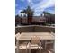 Balcony with scenic views features a stylish outdoor table and chairs at 87 E Agate Ave # 202, Las Vegas, NV 89123