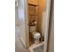 Bathroom with toilet, shelving, and gray carpet at 87 E Agate Ave # 202, Las Vegas, NV 89123