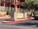 Park Avenue Condominiums entrance with well-manicured landscaping and classic signage at 87 E Agate Ave # 202, Las Vegas, NV 89123