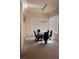 Bright dining area with modern lighting, large windows, and contemporary table with chairs at 87 E Agate Ave # 202, Las Vegas, NV 89123