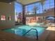 The indoor pool has floor-to-ceiling windows and is adjoined by an outdoor pool at 87 E Agate Ave # 202, Las Vegas, NV 89123