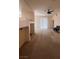Spacious living room with large windows, ceiling fan, and neutral decor at 87 E Agate Ave # 202, Las Vegas, NV 89123