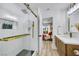 Modern bathroom featuring a glass enclosed shower, double vanity, and designer fixtures at 9078 Hilverson Ave, Las Vegas, NV 89148