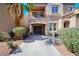 Exterior elevation of the home featuring an attached garage and a second floor balcony at 9078 Hilverson Ave, Las Vegas, NV 89148