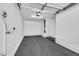 View of the clean and empty garage at 9078 Hilverson Ave, Las Vegas, NV 89148