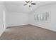 Spacious bedroom with vaulted ceilings, ceiling fan, and large windows at 9436 Darwell Dr, Las Vegas, NV 89117