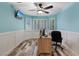 Well-lit home office with a large window and desk, perfect for remote work at 9436 Darwell Dr, Las Vegas, NV 89117