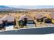Charming single-story home with a three-car garage and desert landscaping at 977 Majestic Vw, Mesquite, NV 89034