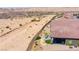 Expansive backyard with a desert view, patio, synthetic grass, and beautiful landscaping at 977 Majestic Vw, Mesquite, NV 89034