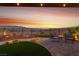 Enjoy the backyard patio with desert landscaping and scenic mountain views at 977 Majestic Vw, Mesquite, NV 89034