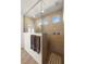Walk-in shower featuring beige tile and a modern glass divider at 977 Majestic Vw, Mesquite, NV 89034
