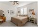 Neutral bedroom with a warm color scheme, including a bed and bedside tables at 977 Majestic Vw, Mesquite, NV 89034