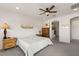 Bedroom featuring white walls, carpet flooring and access to the ensuite bathroom at 977 Majestic Vw, Mesquite, NV 89034