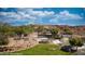 View of the community waterfall feature with beautiful stone work and manicured greenery at 977 Majestic Vw, Mesquite, NV 89034