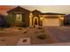 Attractive single-story home featuring desert landscaping, and a spacious two-car garage at 977 Majestic Vw, Mesquite, NV 89034