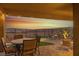 Inviting patio with string lights, outdoor seating, and stunning mountain views at 977 Majestic Vw, Mesquite, NV 89034