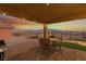 Outdoor patio featuring mountain views, artificial turf, and a stainless steel grill at 977 Majestic Vw, Mesquite, NV 89034