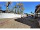 View of the backyard showcasing the in-ground pool with privacy fence and a rock landscape at , Henderson, NV 89014