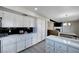 Bright and spacious kitchen with white cabinets, marble countertops and stainless steel appliances at , Henderson, NV 89014