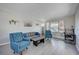 This comfortable living room features natural light and is the perfect place to relax and unwind at , Henderson, NV 89014