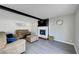Bright living room with a cozy fireplace, neutral decor, and comfortable seating arrangement at , Henderson, NV 89014