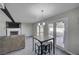 Comfortable living space with a fireplace, backyard access, and breakfast nook nearby at , Henderson, NV 89014