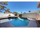 Private backyard pool and spa surrounded by mature landscaping and block wall fencing at , Henderson, NV 89014