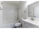Bathroom with bathtub, toilet and vanity with a mirror at 10162 Lemon Thyme St, Las Vegas, NV 89183