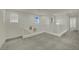 Spacious carpeted loft area with natural light at 10345 Zebra Swallowtail St, Las Vegas, NV 89141