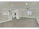Carpeted loft space with natural light and open layout at 10345 Zebra Swallowtail St, Las Vegas, NV 89141