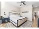 Comfortable bedroom featuring a modern bed frame, stylish rug, and an abundance of natural light at 10504 Button Willow Dr, Las Vegas, NV 89134