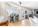 Bright breakfast nook area with barstool seating, views of the backyard, and an open floorplan at 10504 Button Willow Dr, Las Vegas, NV 89134