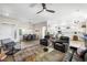 Spacious living room, dining and kitchen area featuring hardwood floors, and a welcoming atmosphere at 10504 Button Willow Dr, Las Vegas, NV 89134
