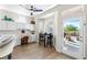 Bright home office with built-in desks, ample storage, and a lovely outdoor view at 10504 Button Willow Dr, Las Vegas, NV 89134