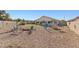 Spacious backyard with patio, fire pit and play area, perfect for outdoor entertaining at 1079 Oak Shade Ln, Henderson, NV 89015