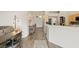 Open entryway featuring stylish decor, hardwood flooring, and convenient coat closet at 1079 Oak Shade Ln, Henderson, NV 89015