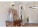 Bright and inviting entryway featuring stylish decor and modern lighting at 1079 Oak Shade Ln, Henderson, NV 89015