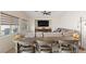 Cozy living room featuring a large sectional sofa and mounted TV at 1079 Oak Shade Ln, Henderson, NV 89015