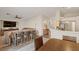 Open-concept living space featuring kitchen, living room, and dining area at 1079 Oak Shade Ln, Henderson, NV 89015