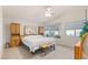 Spacious main bedroom featuring neutral colors, built-in storage, and bright windows at 1079 Oak Shade Ln, Henderson, NV 89015
