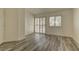 Spacious bedroom with shuttered windows and sliding glass doors leading to a balcony at 108 Broken Rock Dr, Henderson, NV 89074
