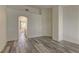 Bedroom with an arched entrance to an ensuite bathroom with tub and window view at 108 Broken Rock Dr, Henderson, NV 89074