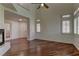 Inviting living room with hardwood floors, a fireplace, and bright windows offering lots of natural light at 108 Broken Rock Dr, Henderson, NV 89074