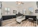 Home office with custom built-ins, natural light, and dark accent wall at 12438 Heritage Bend Dr, Las Vegas, NV 89138