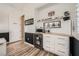 Office space with custom cabinetry, beverage fridge, and wood countertops at 12438 Heritage Bend Dr, Las Vegas, NV 89138