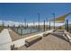 Community pickleball court and shaded seating provide a recreational outdoor space at 12438 Heritage Bend Dr, Las Vegas, NV 89138