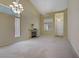 Large, airy living room with fireplace and high ceilings, offering ample space and natural light at 1305 Chaparral Summit Dr, Las Vegas, NV 89117