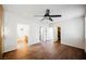 Bright bedroom with hardwood floors, ceiling fan, and multiple closets for ample storage at 132 Soaring Sky Ave, Henderson, NV 89011