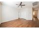 Open bedroom showcasing wood floors, ceiling fan, and closet space at 132 Soaring Sky Ave, Henderson, NV 89011