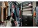 Custom walk-in closet featuring built-in shelving and ample hanging space at 132 Soaring Sky Ave, Henderson, NV 89011
